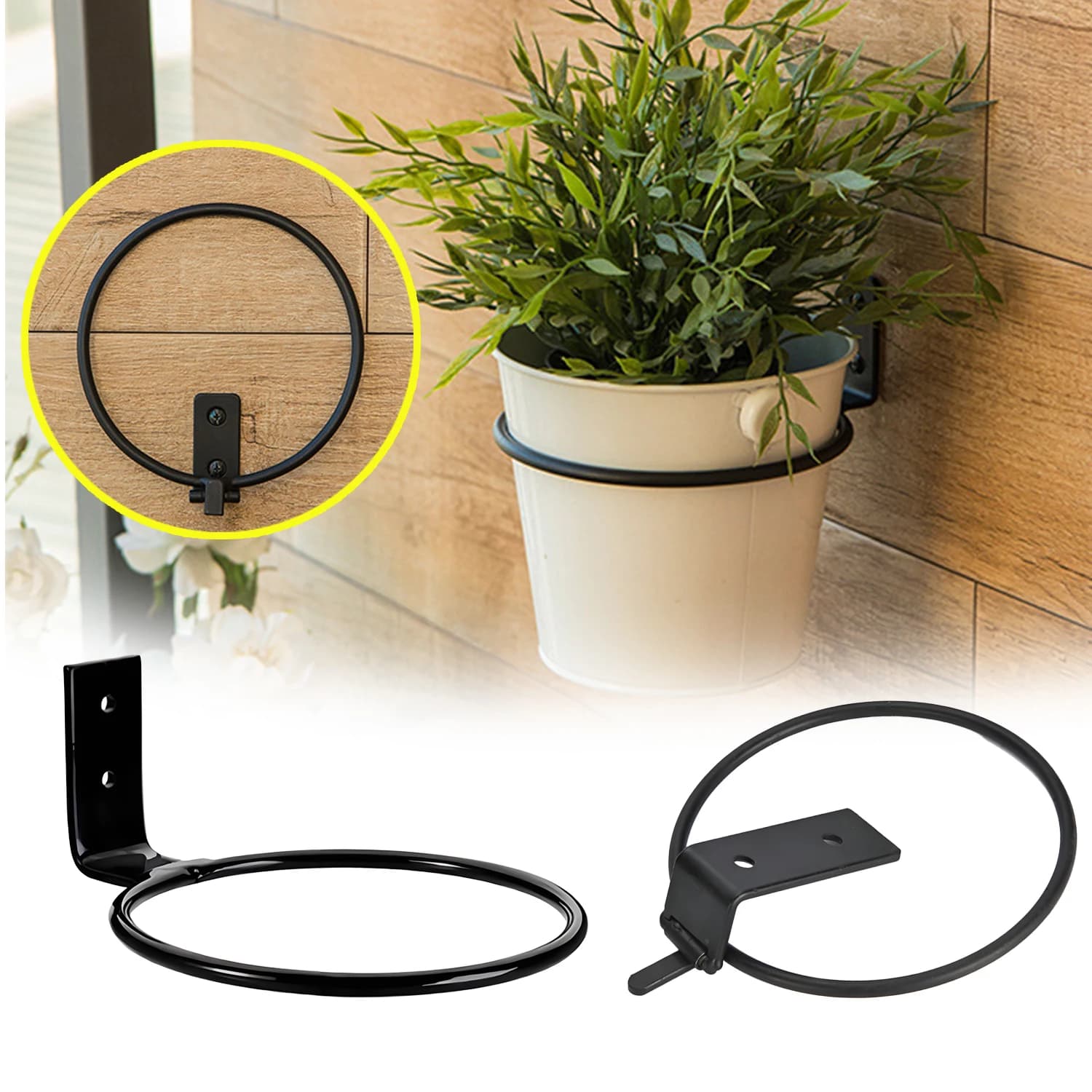 Suporte de parede para plantas em metal preto com vaso branco e planta verde