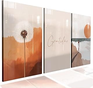 Kit de 3 quadros decorativos com tema 'Gratidão' e paisagem. Primeiro quadro com flor de dente de leão. Segundo quadro branco com sombra laranja. Terceiro quadro com figura de pessoa em penhasco e sol.