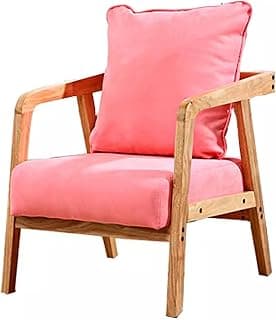 Poltrona Wingback moderna com estrutura de madeira e pernas douradas de metal, assento e encosto estofados em tecido rosa.