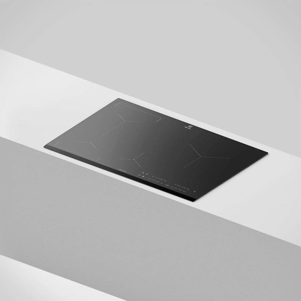 Cooktop de indução instalado em bancada branca design moderno