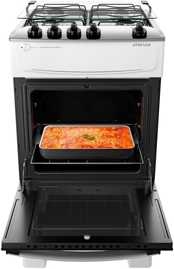Fogão Atlas Atenas 4 bocas branco com mesa inox com forno aberto e lasanha dentro