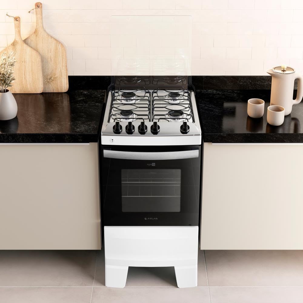 Fogão branco 4 bocas com mesa inox instalado em cozinha moderna com bancada preta